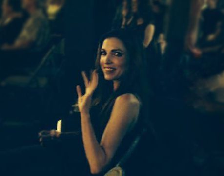 Michele DeMarco Waving